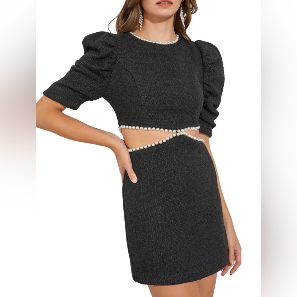 Black cutout dress with Pearl Details.  Size is Small.  Brand Do+Be